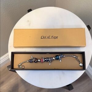 Silver Charm Bracelet with Blue and Red Accents